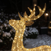 Close-up of the glittering gold wire and micro lights on the deer's antlers