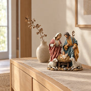 Nativity scene figurine on a light oak console in a hallway