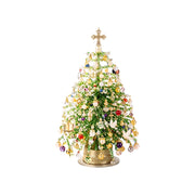 Pale green and gold beaded holiday tree with cross-shaped top on white