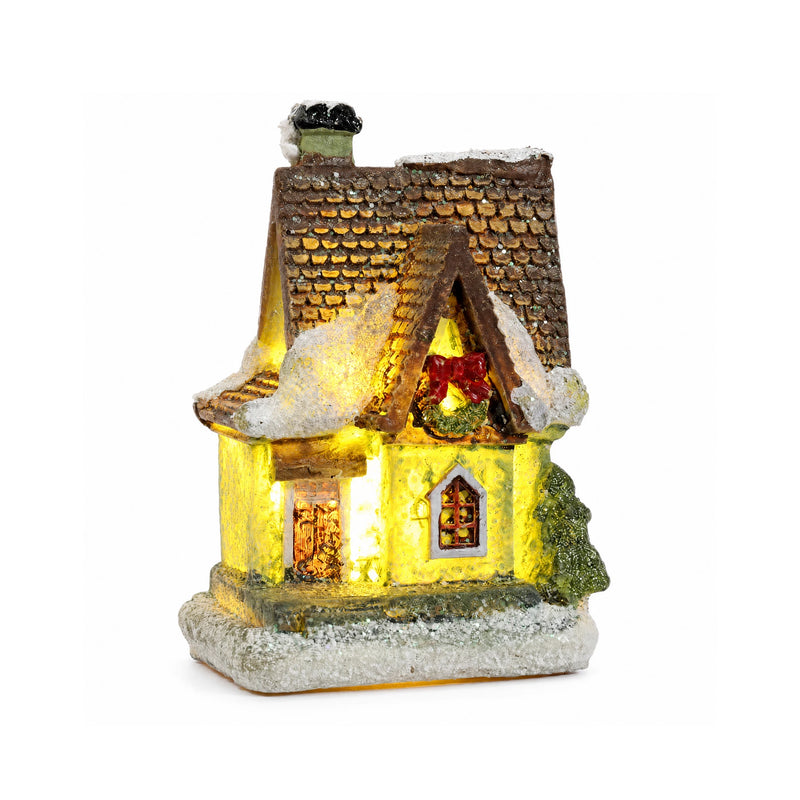 Style G snow-covered resin Christmas village house on a white background