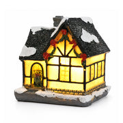 Style D snow-covered resin Christmas village house on a white background