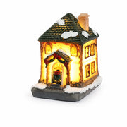 Style A snow-covered resin Christmas village house on a white background