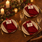 Letter stockings used as place cards on a Christmas table