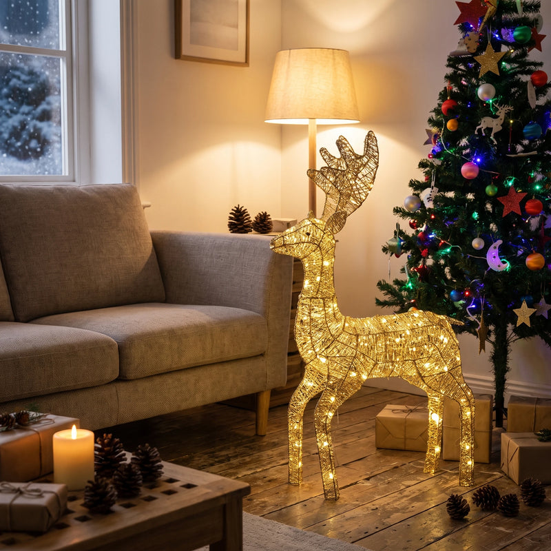 Glowing gold deer next to a Christmas tree in a living room