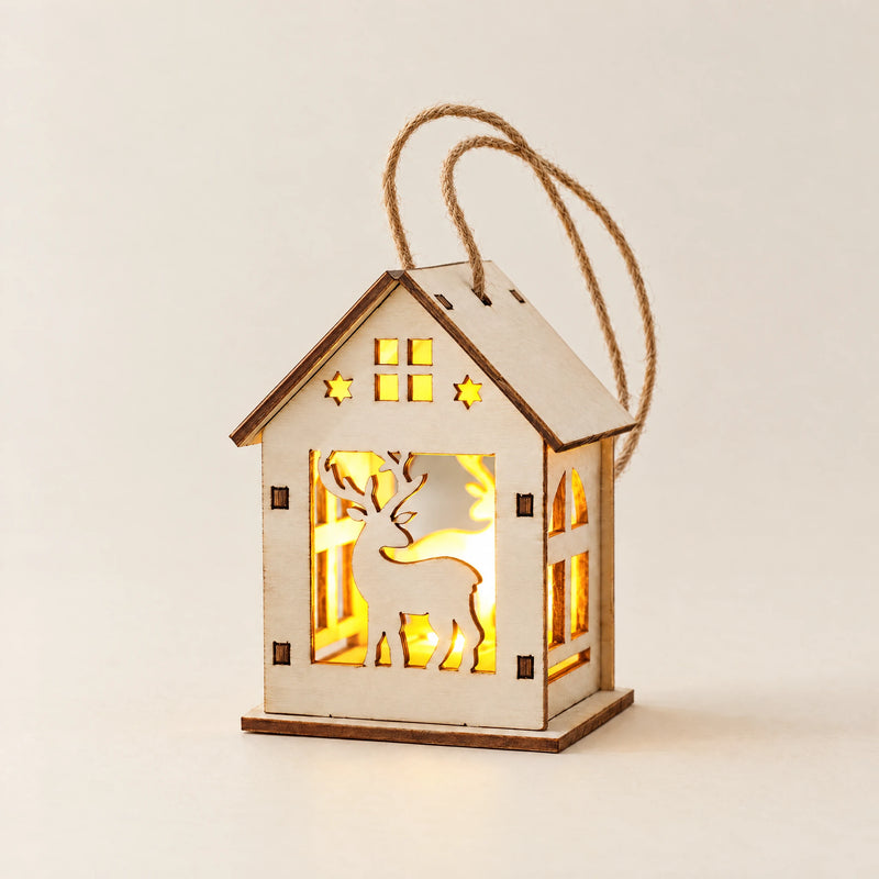 S9 reindeer lighted Christmas house ornament on a neutral cream surface