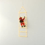 Santa Climbing Ladder Light, 1.5 m Warm White, on a pale neutral background