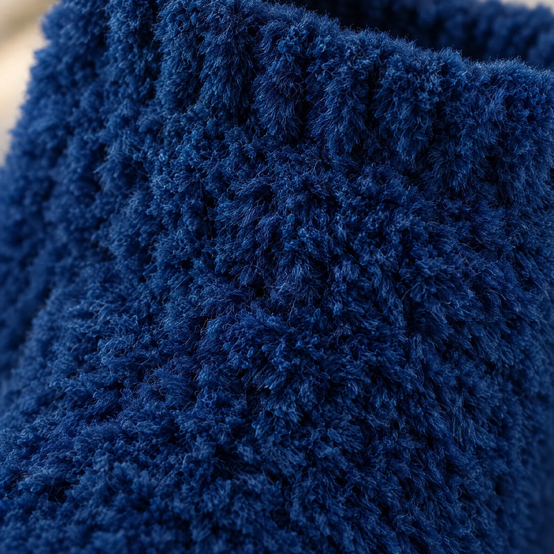 Macro close-up of the brushed fleece pile of the navy socks