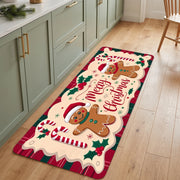 Gingerbread Christmas runner beside sage-green kitchen cabinets on an oak floor